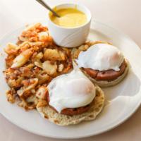 Classic Eggs Benedict · Two poached eggs on a toasted english muffin with canadian bacon & hollandaise sauce, served...