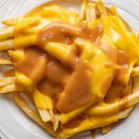 Disco Fries · Piled High with your Choice of American or Mozzarella Cheese and a Side of Brown Gravy.