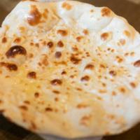 Naan · Soft white flour bread baked in the Tandoor (clay oven).