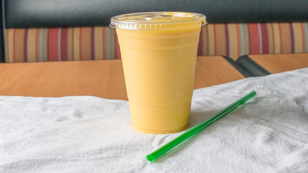 Mango Lassi · Made with yogurt and mango purée.