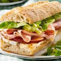 Jambon Fromage Baguette · French Heritage Delightful Smoked ham accompanied with Swiss cheese, lettuce, tomato, and Di...