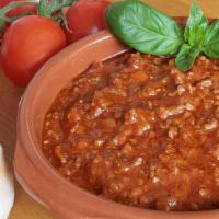 Tomato With Meat · Mixed tomato with lamb meat virgin olive oil, onion, garlic, salt and pepper.