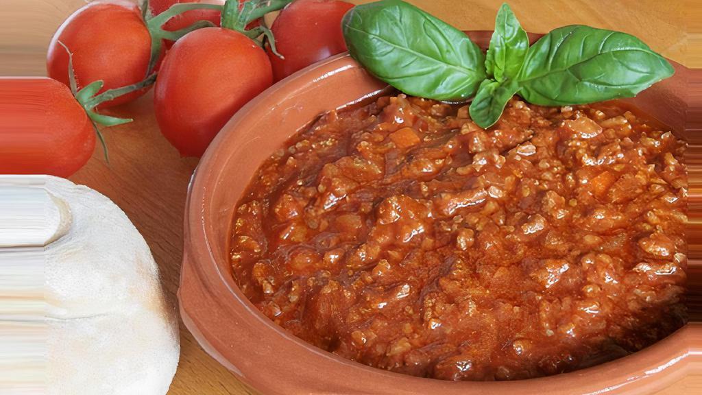 Tomato With Meat · Mixed tomato with lamb meat virgin olive oil, onion, garlic, salt and pepper.