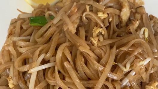 Pad Thai · Stir- fried thai noodle w. egg, scallion, bean sprouts, dry tofu topped w. ground peanuts