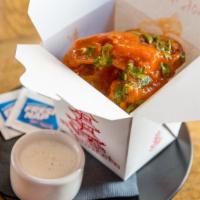 Wings · Frank's red hot, cilantro and ranch. 8 pieces