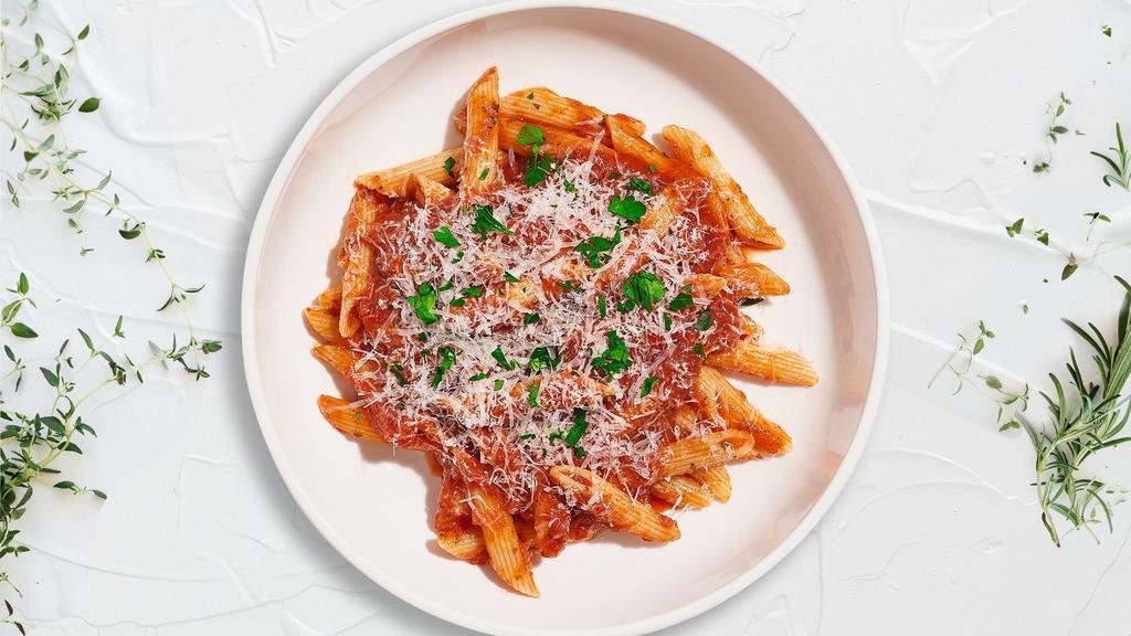 Thrill Of The Spicy Tomato Gf Penne · (Gluten Free & Vegetarian) Fresh penne pasta cooked in a spicy tomato and topped with black pepper, parsley, and parmesan.