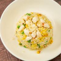 Crab Fried Rice · Crab meat, corn, vegetables, scrambled egg, white pepper.