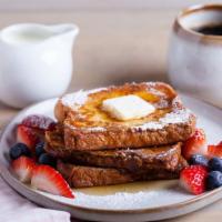 Original French Toast · Sliced challah bread soaked in eggs and milk, then fried served with a side of butter and sy...