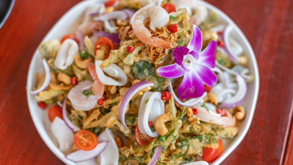 Crispy Kung Fu Spicy Watercress Salad · Spicy. Shrimp, calamari, red onion, cashew nut, and chili lime sauce.