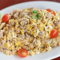 Crab Meat Fried Rice · Crab meat, onion, tomato, carrot, scallions and egg.