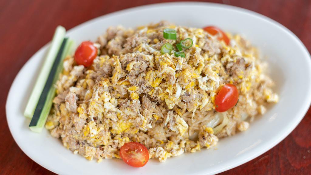 Crab Meat Fried Rice · Crab meat, onion, tomato, carrot, scallions and egg.