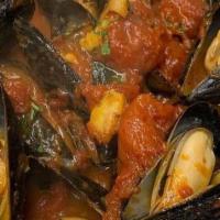 Mussels In White Wine And Garlic · Mollusk.
