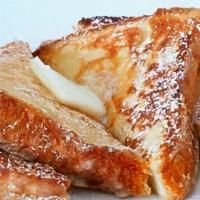 Thick Cut French Toast · 3 slices of thick cut French Toast served with side of maple syrup and butter.