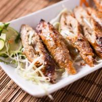 Chicken Sheek Kabab · Minced chicken and spices are mixed together and cooked in clay oven.
