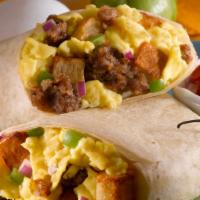 Meaty Breakfast Burrito · Scrambled eggs, bacon, sausage, ham, mushroom, breakfast potatoes and Monterey jack cheese w...