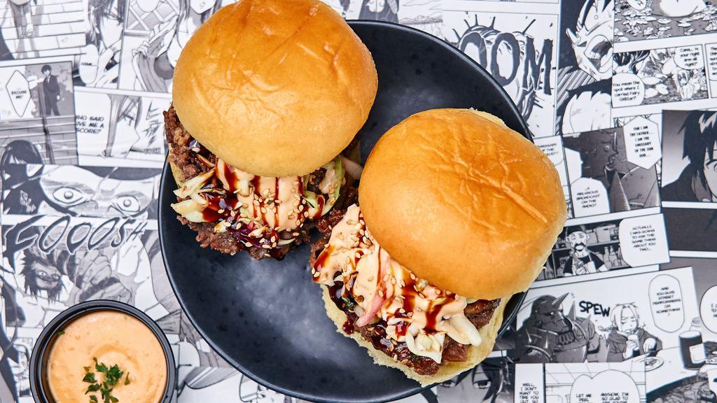 Two Bulgogi Ribeye Sliders · Two of our thinly sliced soy marinated USDA Choice ribeye beef in a bulgogi marinade with a cabbage slaw, pickled cucumbers, and umami shoyu reduction, and truffle essence