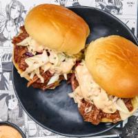 Two Bbq Beef Sliders · Slowly smoked hand-pulled BBQ beef doused in our homemade bbq sauce served in soft potato sl...