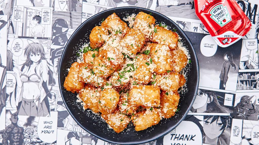 Truffle Parmesan Tots · Crispy tater tots with freshly grated parmesan cheese, white truffle oil and chives.