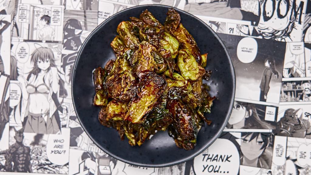 Fried Brussel Sprouts · Freshly fried baby brussel sprouts with a yuzu balsamic glaze