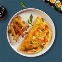 Nova Scotia Omelette · Three organic eggs, lox, onions, tomatoes, and chives.