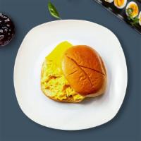 Two-Egg Sandwich With Cheese · Two organic eggs any style with cheese on choice of bread.