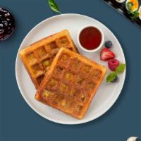 Waffles · Classic homemade waffles served with maple syrup.