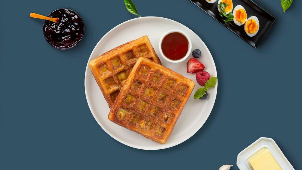 Waffles · Classic homemade waffles served with maple syrup.