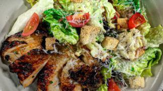 Chicken Caesar Salad · With romaine lettuce, Parmesan, grilled chicken and croutons.