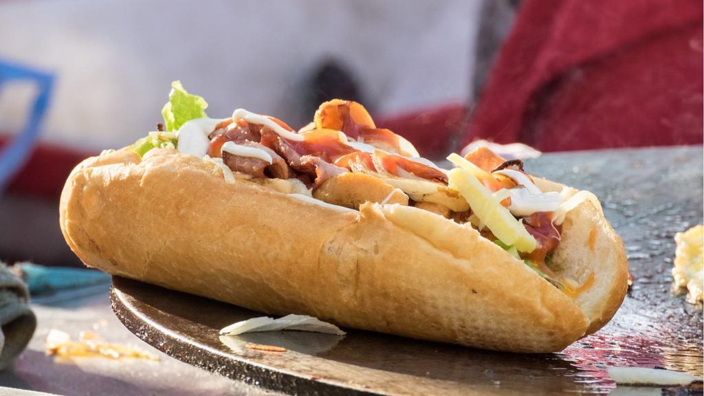 Bacon Fried Chicken Hero · Crispy chicken, savory bacon, cheese, basil, avocado, and chipotle mayo on fresh baked hero.