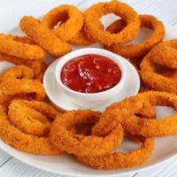 Onion Rings · Our thick-cut onion rings are made from whole white onions, battered with a subtle blend of ...