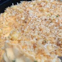 Lobster Mac & Cheese · shell Pasta, Maine lobster and three cheese, topped with toasted bread crumbs. top seller! m...