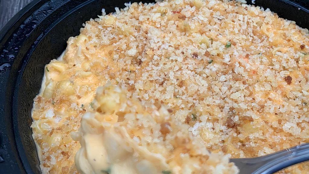 Lobster Mac & Cheese · shell Pasta, Maine lobster and three cheese, topped with toasted bread crumbs. top seller! must try!.