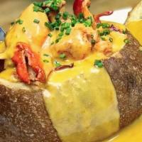 Lobster Bomb! · half a pound of butter lobster meat in a tasted sourdough bread and lobster bisque. top sell...