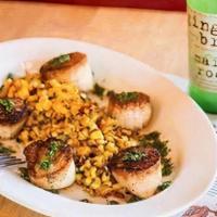 Pan Seared Sea Scallops · Served with Charred grilled Corn Salsa, roasted yellow pepper and corn puree. Lemon and oliv...