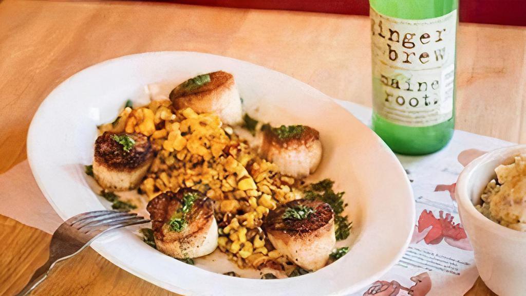 Pan Seared Sea Scallops · Served with Charred grilled Corn Salsa, roasted yellow pepper and corn puree. Lemon and olive oil vinaigrette.