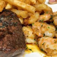 Steak And Shrimp · filet mignon, garlic shrimp, old bay and a side house salad