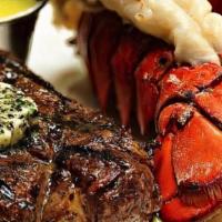Steak & Lobster Tail · filet mignon, one lobster tails 4oz  with French fries and a side salad