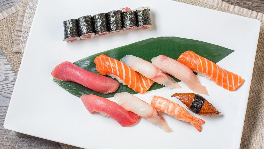 Sushi Deluxe · Nine pieces of sushi and one tuna roll. Served with miso soup or salad.