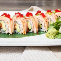 American Dream Roll · Salmon, avocado and cucumber inside, with spicy king crab, snow crab,and mixed red tobiko on...
