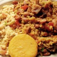Calentado Con Chicharron Y Arepa · Rice mixed with beans and pork skin.
