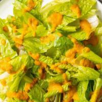 Garden Salad · With ginger dressing.