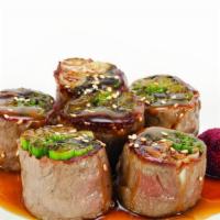 Beef Negimaki Appetizer · Thinly sliced rib eye beef rolled with scallions, broiled with house teriyaki sauce.