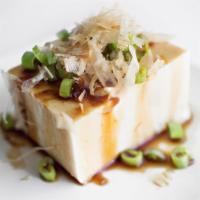 Hiya Yako · Cold soft bean curd served with fresh grated ginger, bonito, scallion and soy sauce.
