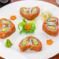 Sweet Heart Roll · Salmon, avocado, cucumber and tempura crunchy inside with spicy tuna outside. Served with sp...