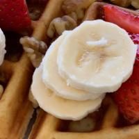 Beechwood Waffle · Berries, bananas, walnuts, whipped cream, warm maple syrup.