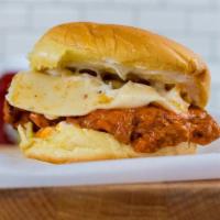 Buffalo Chicken Sandwich · Our Fried Chicken Sandwich, smothered in our house made Buffalo Sauce.
Served on Martin's Po...
