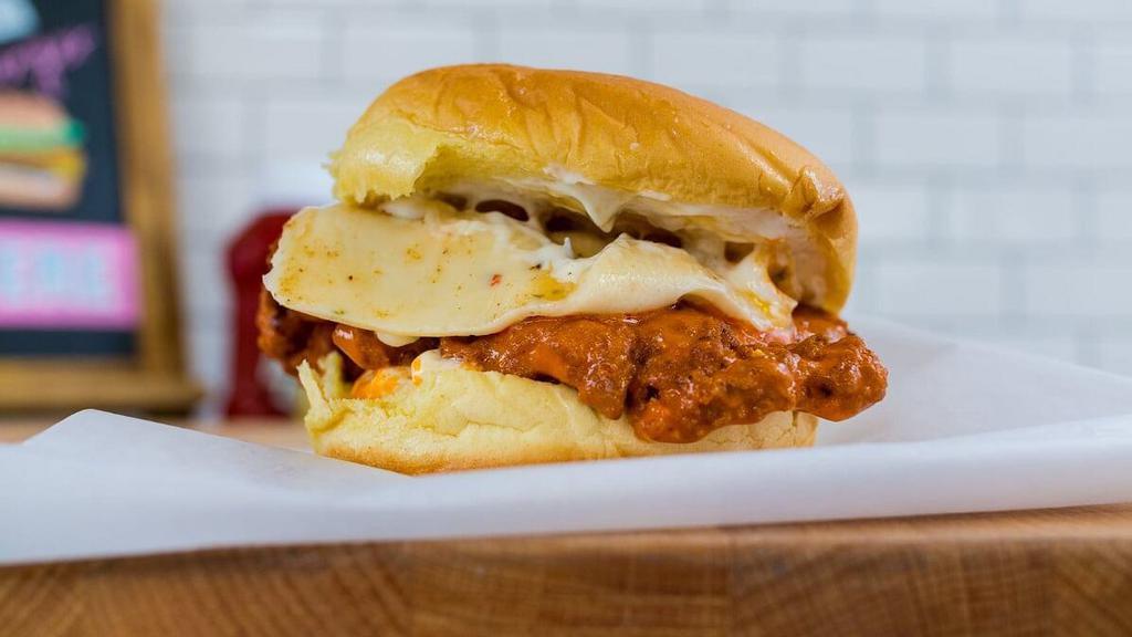 Buffalo Chicken Sandwich · Our Fried Chicken Sandwich, smothered in our house made Buffalo Sauce.
Served on Martin's Potato Bun
