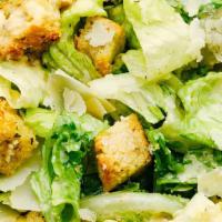 Caesar Salad · Homemade Croutons, Caesar Dressing, Parmesan Cheese.