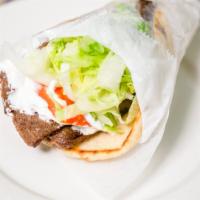 Lamb Gyro Sandwich · Served with lettuce, tomatoes, onion and tzatziki sauce.