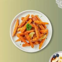 Sweet, Sweet Spuds · (Vegetarian) Thick-cut sweet potato wedges fried until golden brown